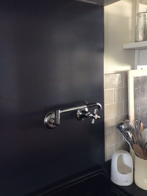 A Kitchen with A Faucet and Utensils on The Counter — R&M Sheetmetal Nowra Metal Roofing in South Nowra, NSW