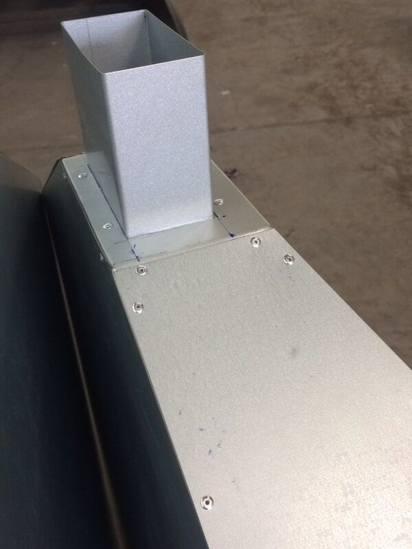 A Metal Pipe Is Sitting on Top of A Metal Surface — R&M Sheetmetal Nowra Metal Roofing in South Nowra, NSW