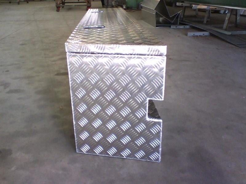 A Metal Box with A Checkered Pattern on It — R&M Sheetmetal Nowra Metal Roofing in Gerringong, NSW