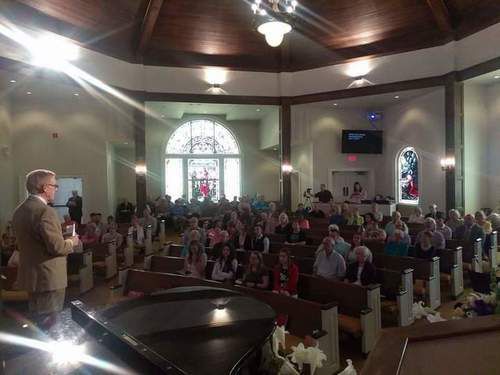 Pastor Preaching on a Sunday Service