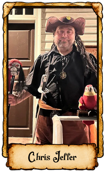 Man in a pirate costume standing indoors beside a parrot decoration, framed like a wanted poster labeled