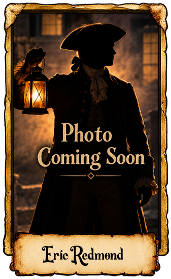 Silhouetted figure holding a lantern, with “Photo Coming Soon” and “Eric Redmond” text on a sepia poster