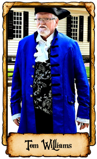 Portrait of Tom Williams in a blue coat and black tricorn hat, standing before a building
