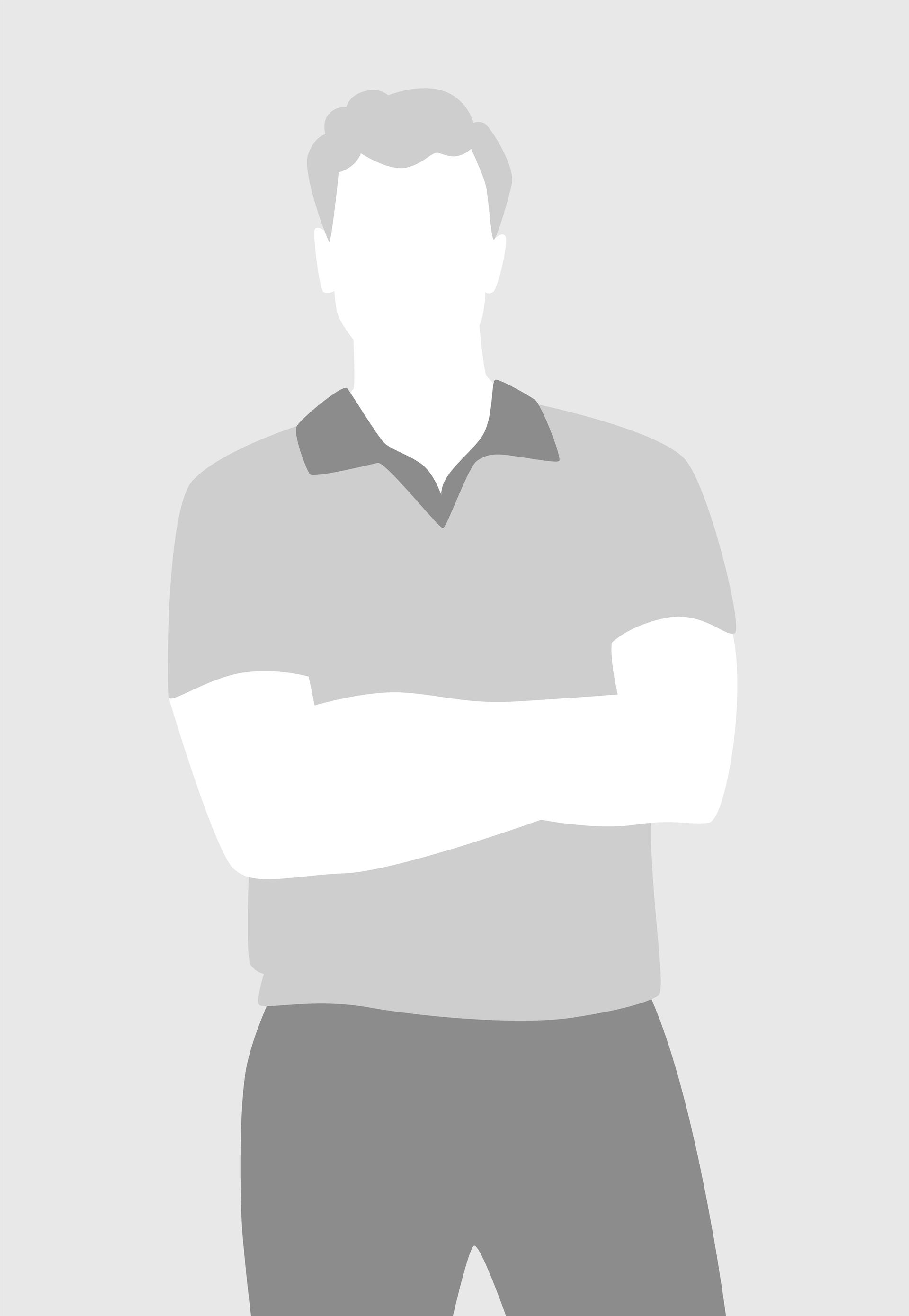 Silhouetted person standing with arms crossed on a light gray background