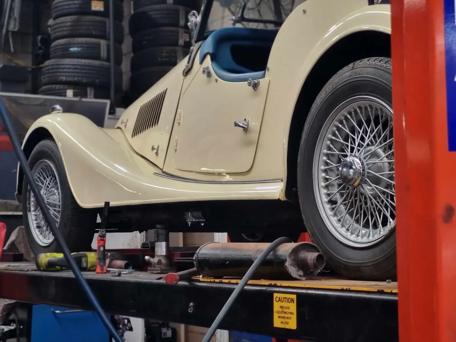 Cream-colored Vintage Sports Car — BJM Mechanical Mufflers & Tyres in Oxenford, QLD