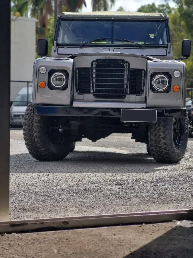Gray, Modified Land Rover Defender — BJM Mechanical Mufflers & Tyres in Oxenford, QLD