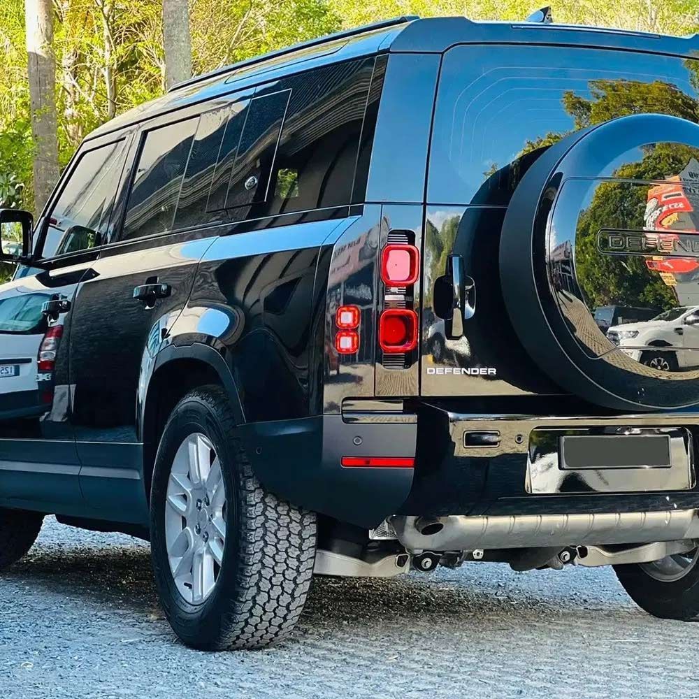 Black Land Rover Defender Parked Outdoors