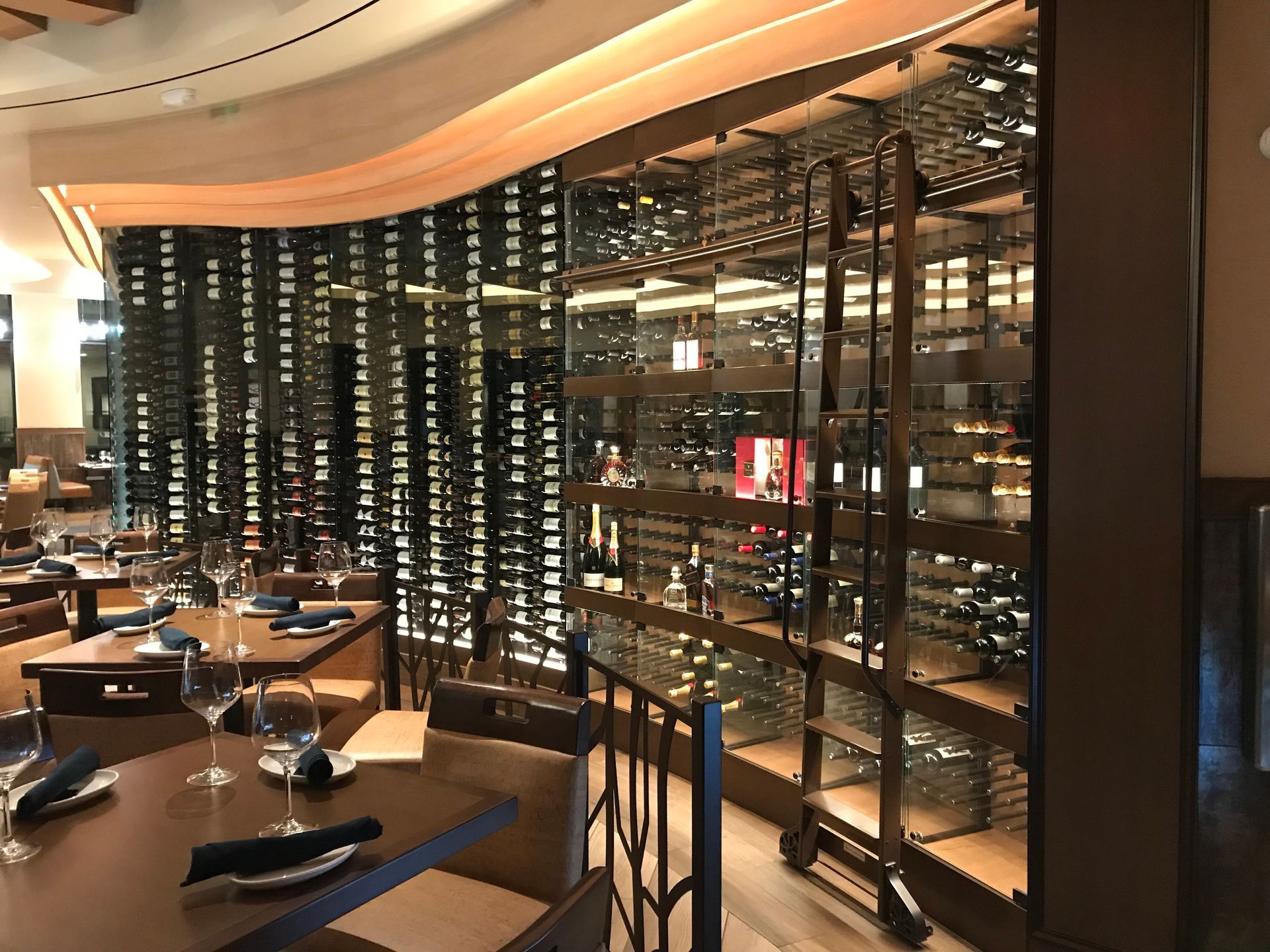 A wine cellar filled with lots of bottles of wine