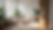 Eye-level view of a clean and organized living room with natural light
