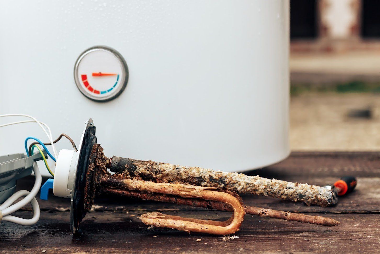 Rusty Water Heater — Seattle, WA — Aurora Plumbing & Electric Rusty Water Heater — Seattle, WA — Aurora Plumbing & Electric