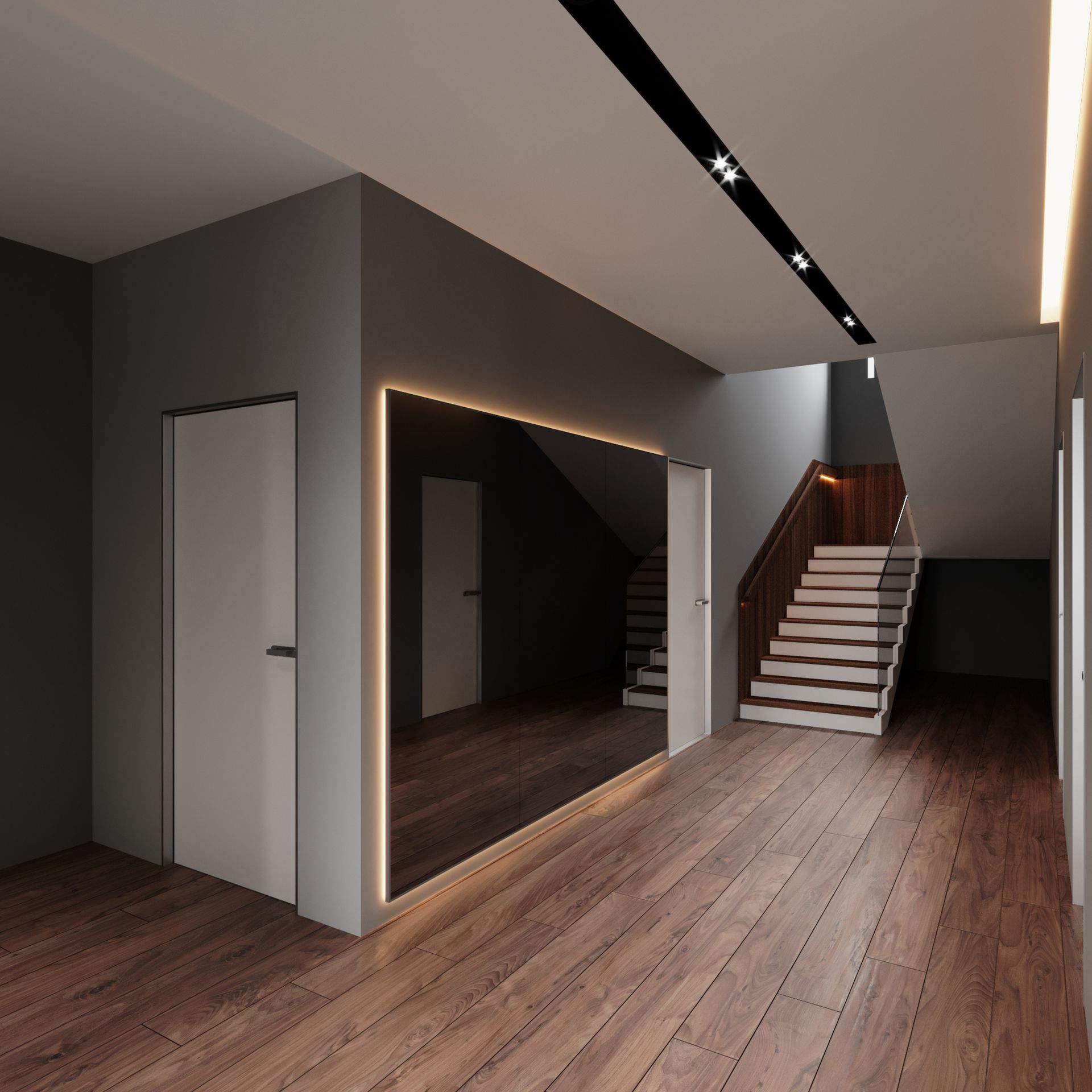 A hallway with stairs and a large mirror on the wall