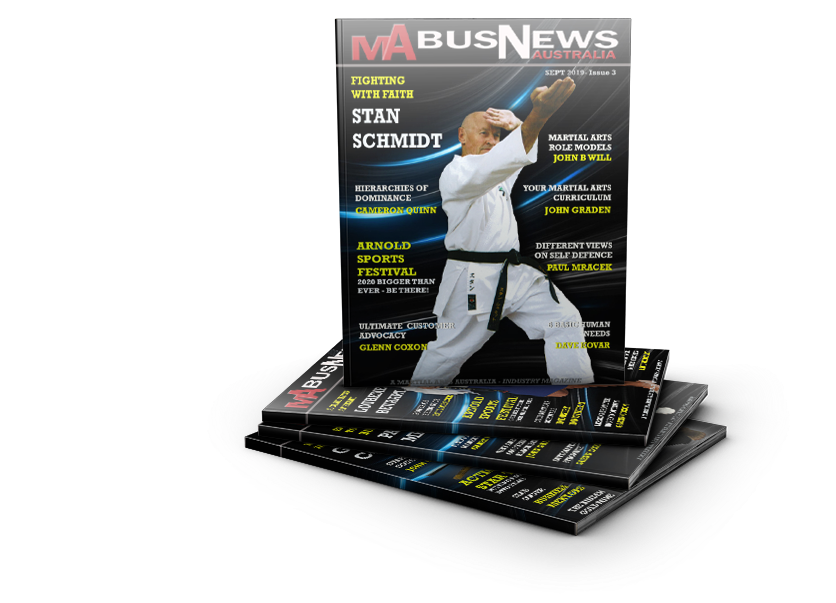 MA BUSINESS MAGAZINE Magazine stack, top issue features karate practitioner, title