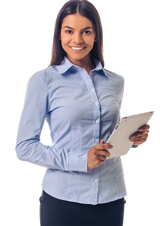 Woman in blue pinstripe shirt, holding a tablet, smiling, on a white background.