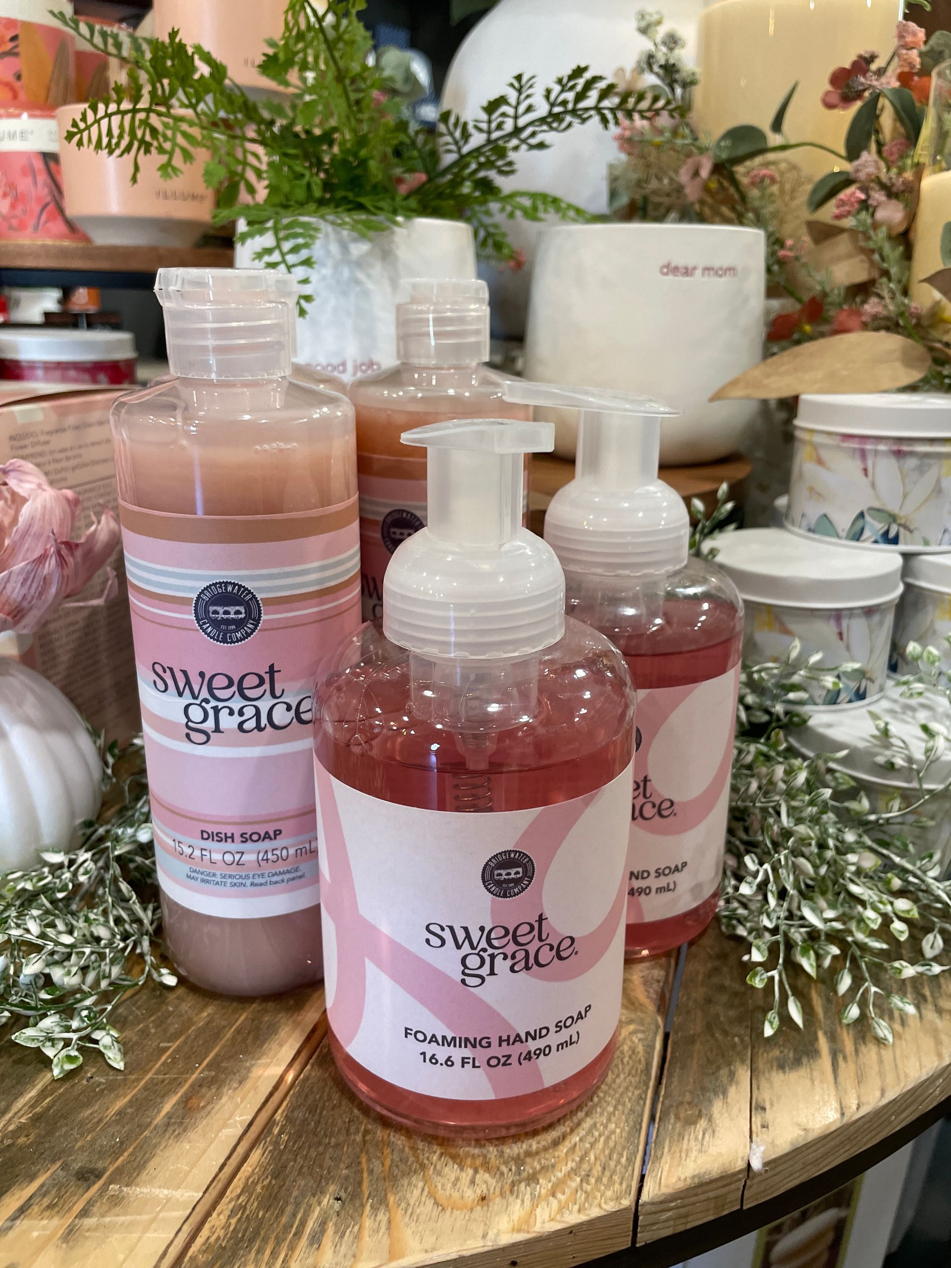 Bottles of pink soap labeled 