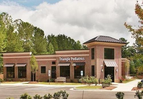 A one-story brick building labeled 