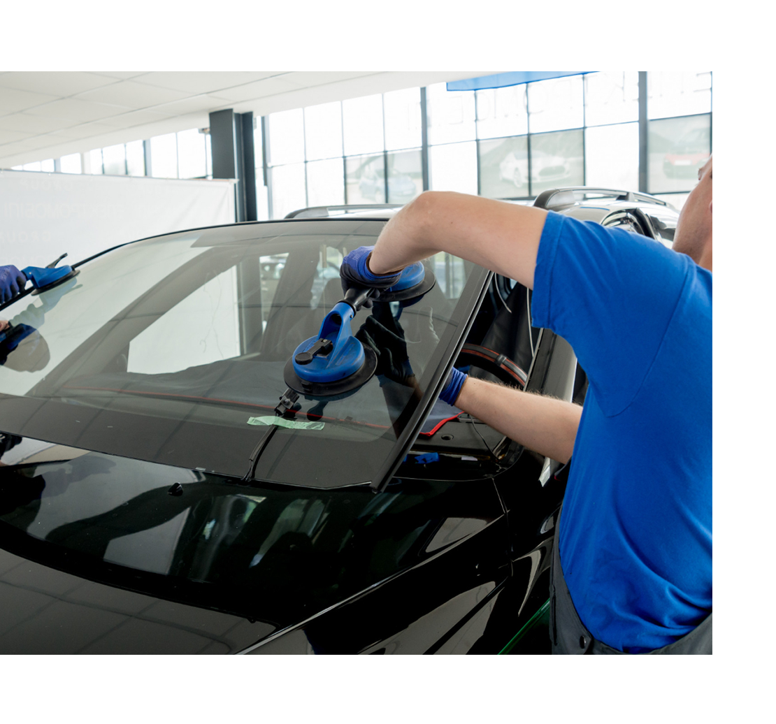 Advanced Auto Glass technician performing windshield installation