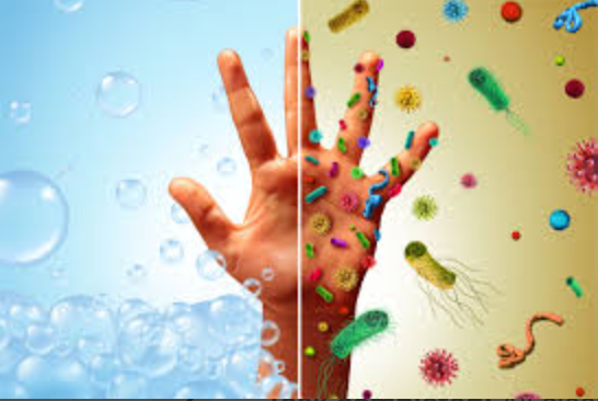 A hand covered in soap and a hand covered in bacteria.