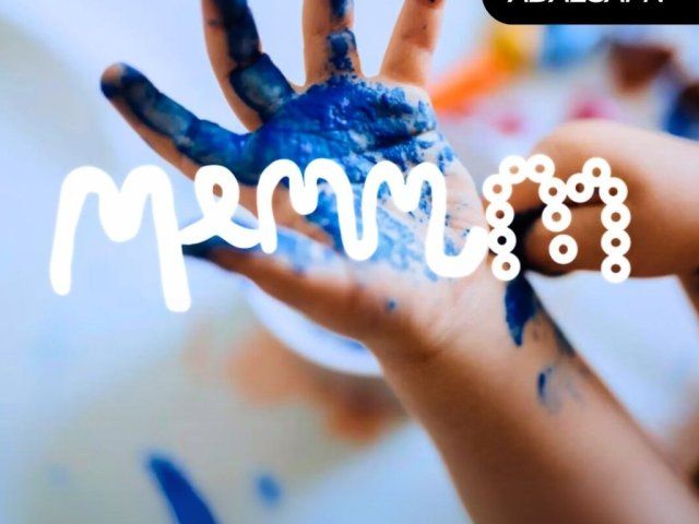 child painting its hand in memmm open preschool
