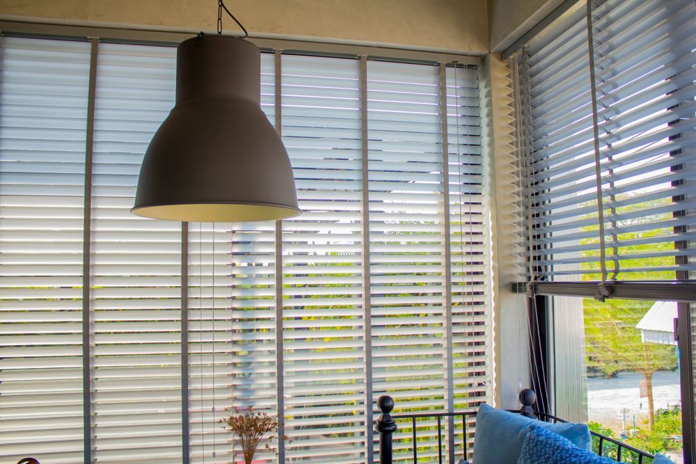 Sunlit Room With White Blinds, Hanging Lamp — Another Blind Man in Buderim, QLD