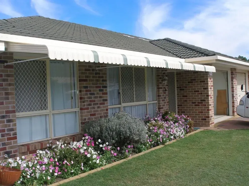 Single-story Brick House With White Awning, Screened Windows — Another Blind Man in Tewantin, QLD