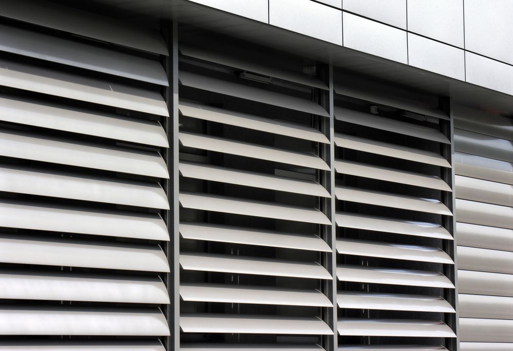 Close-up of Grey Metal Louvered Vents on a Building Exterior — Another Blind Man in Tewantin, QLD