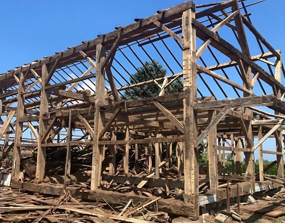 Timber frame vs stick frame: exposed wooden structure.