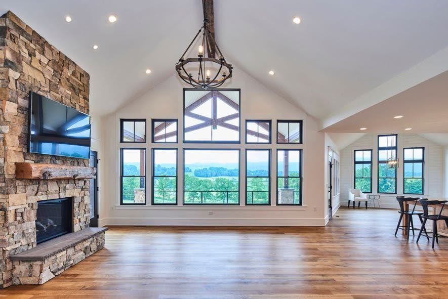 Historic log cutting linked to barn style homes.