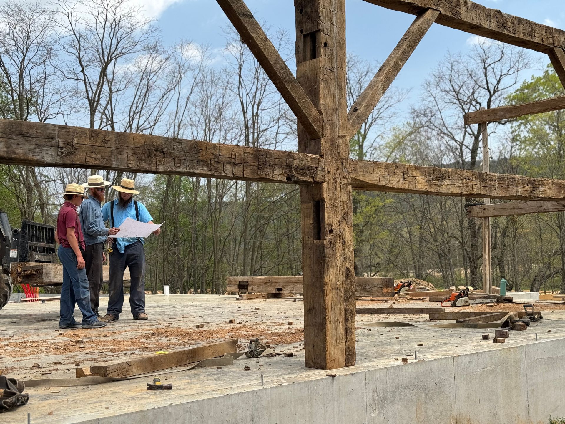A timber-framed structure under construction, built by Pennsylvania timber framing experts.