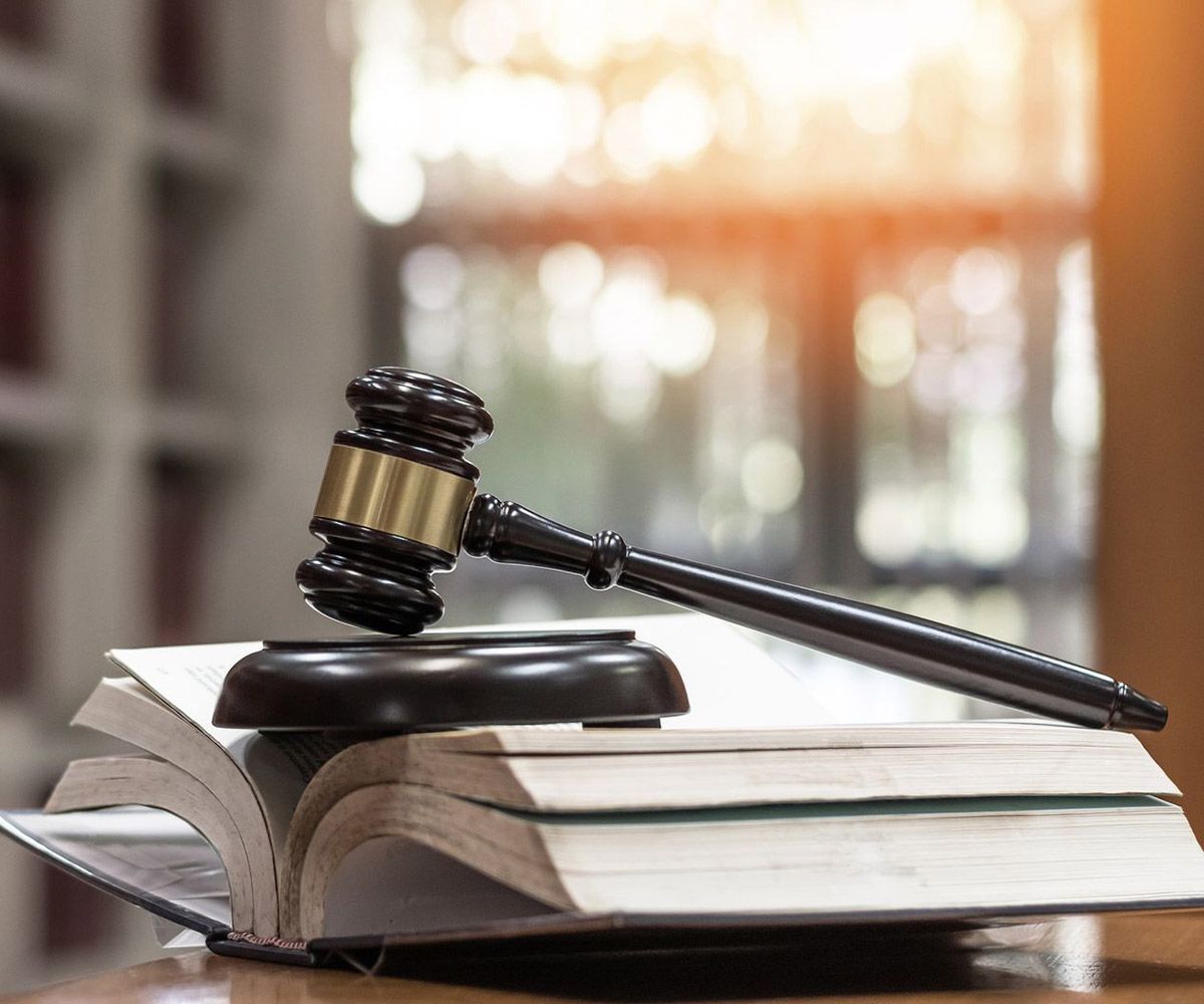 Judge Gavel on Law Textbook — Jacksonville, FL — Law Offices of John S. Kalil