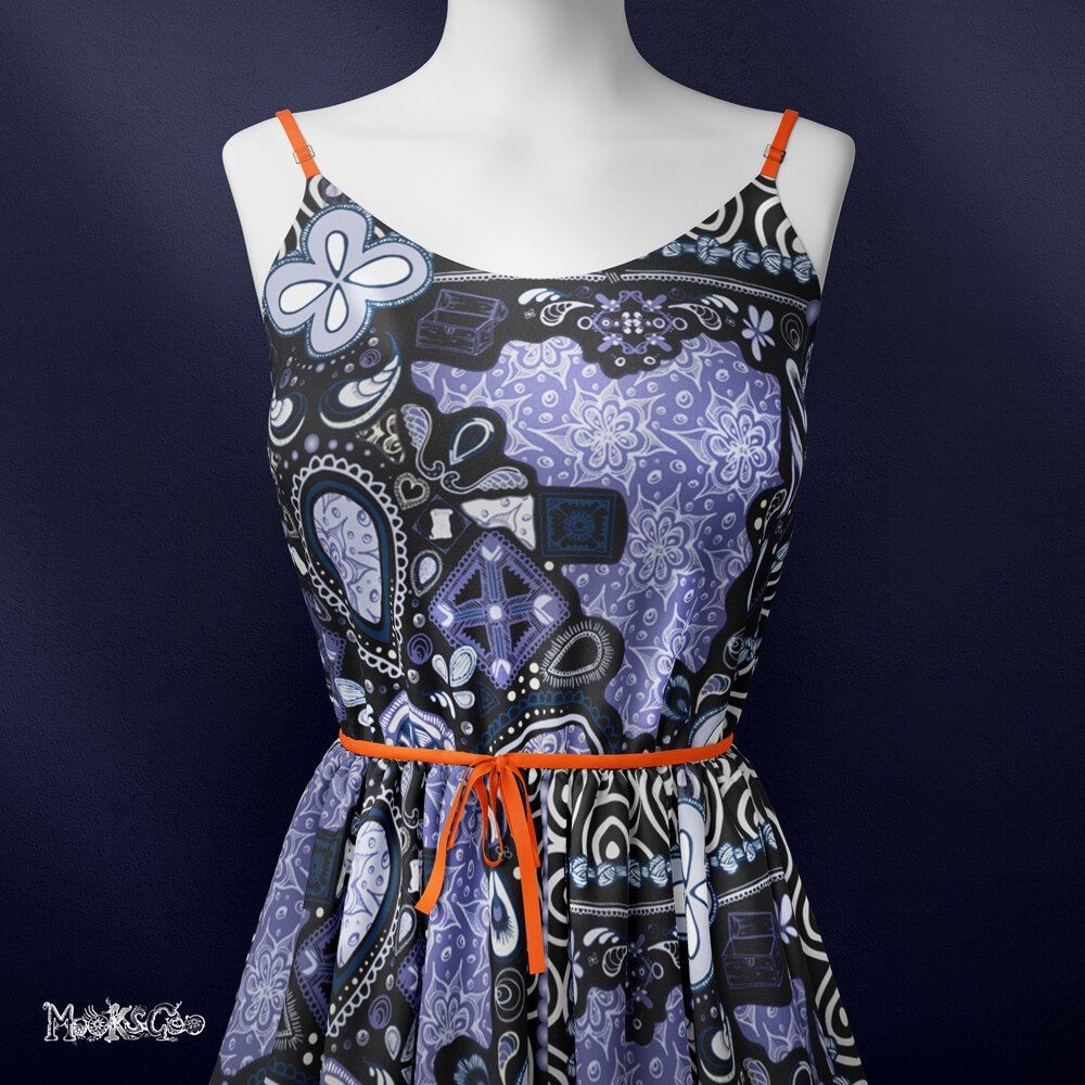 Illustrated ornate heritage square pattern with a blue and purple background with swirly details, applied to a flowing silk dress. Designed by MooksGoo