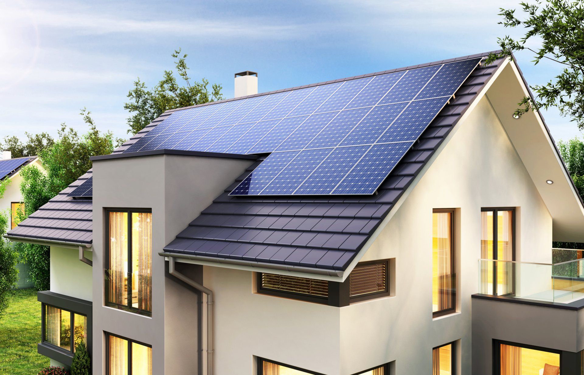 A house with a lot of windows and solar panels on the roof
