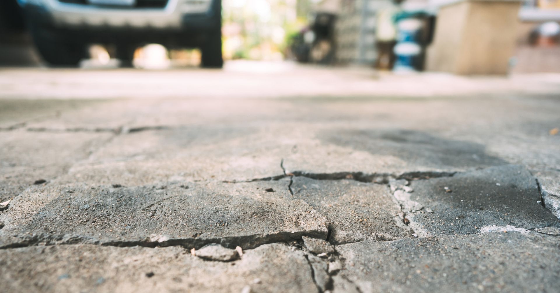 Damaged Driveway - Lee’s Summit, MO - Heartland Fence & Concrete Co.