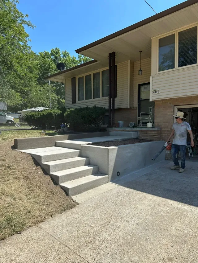 New concrete steps and driveway by Heartland