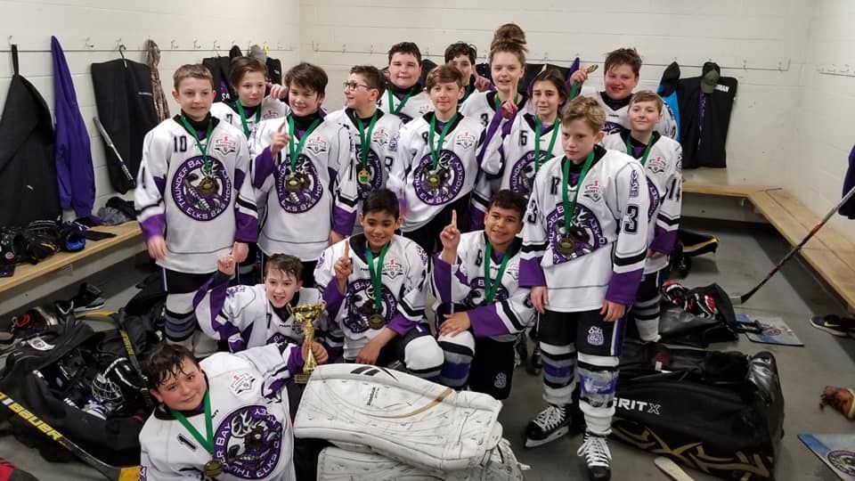 Thunder Bay Elks hockey players on the ice