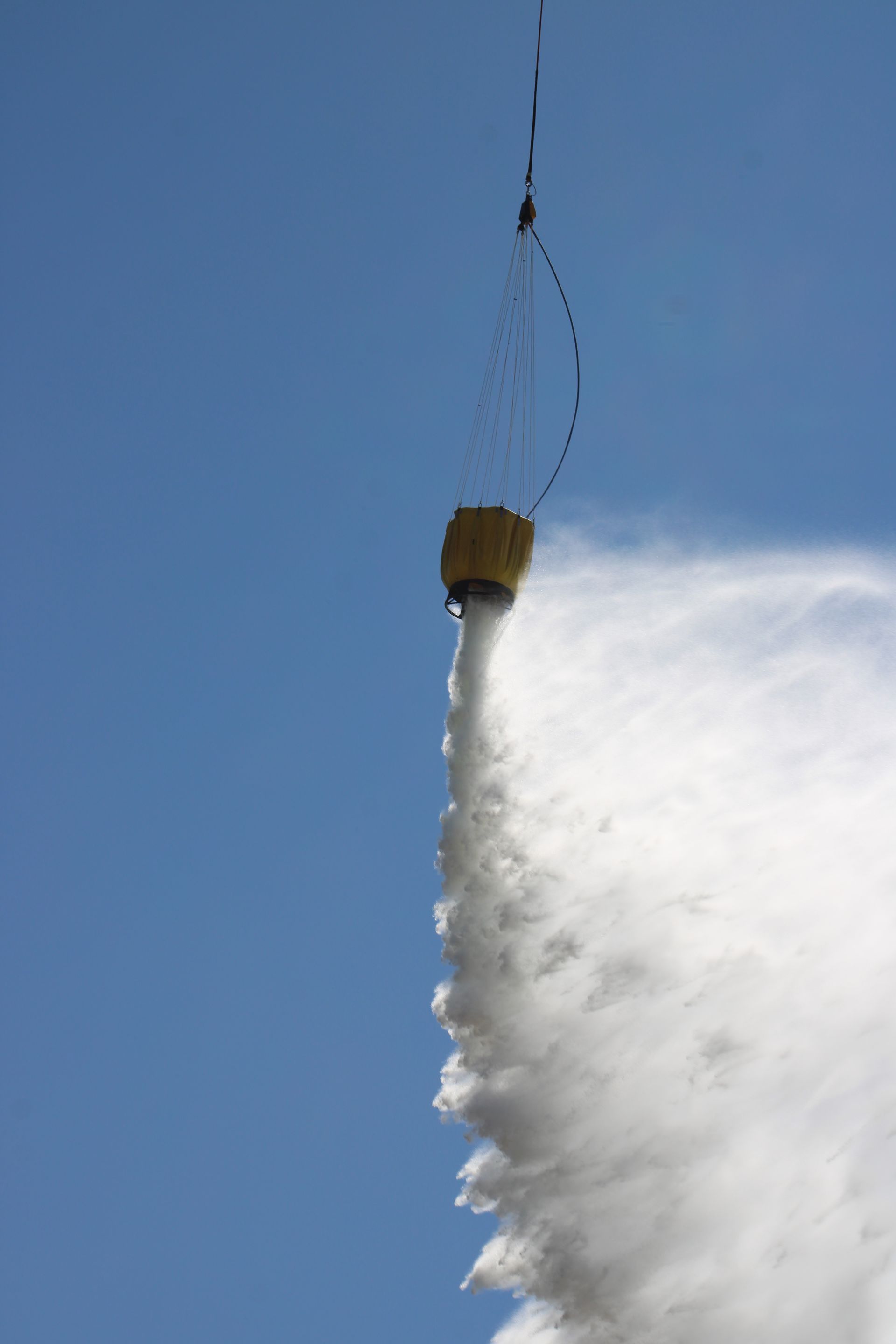 bucket throwing water in the air