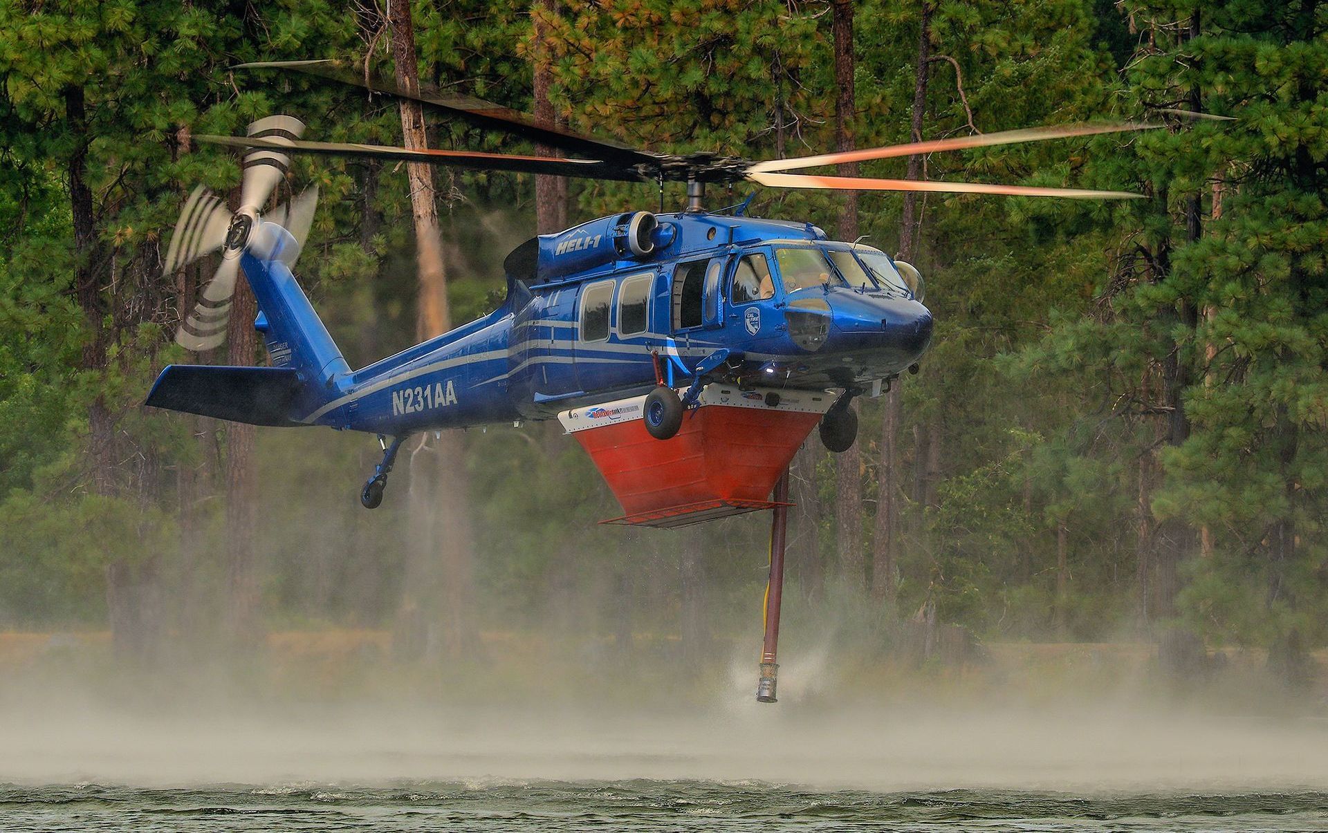 Firefighting helicopter with Helitak hover pump 