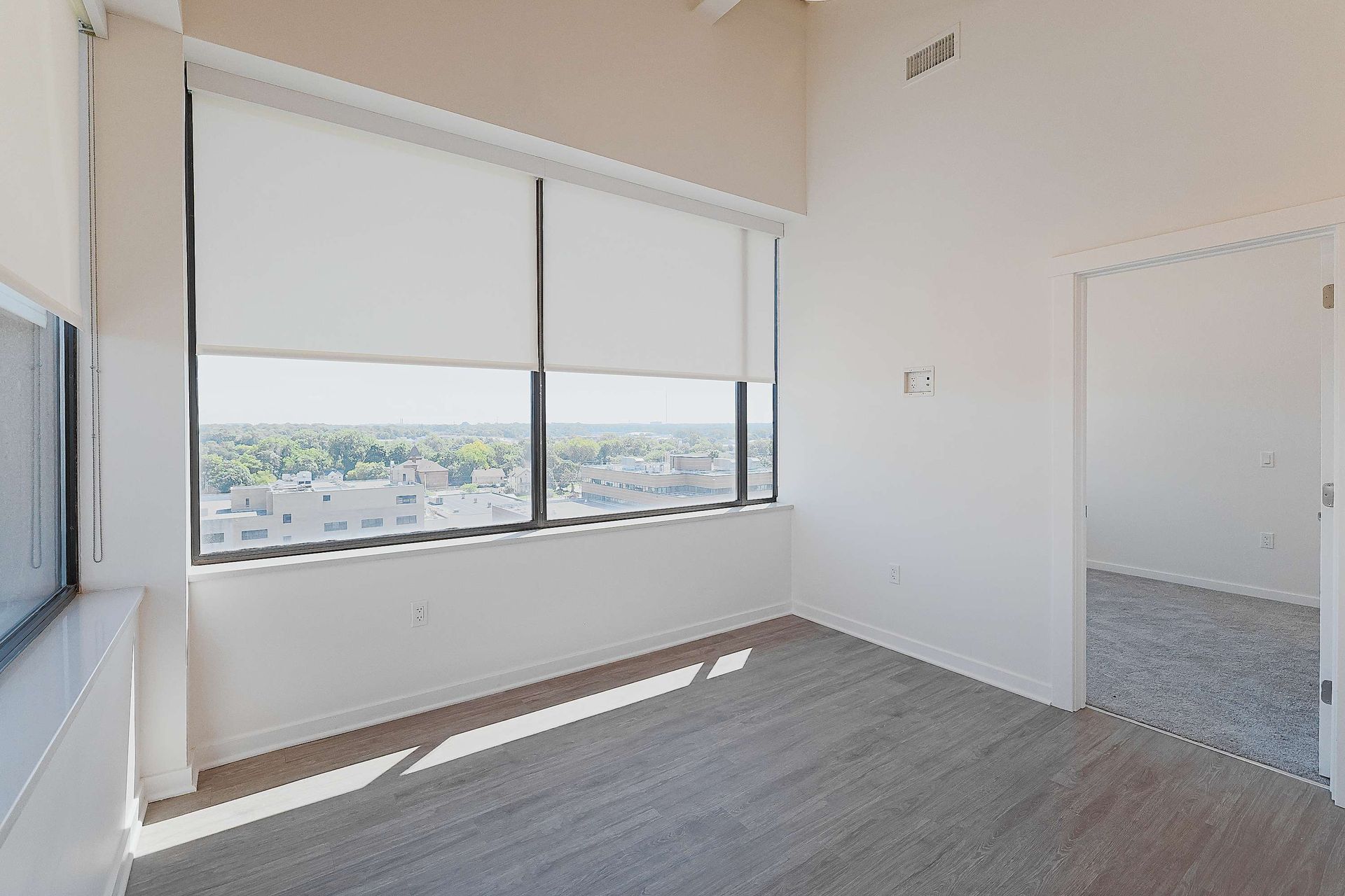 There is a large window in the middle of the room.