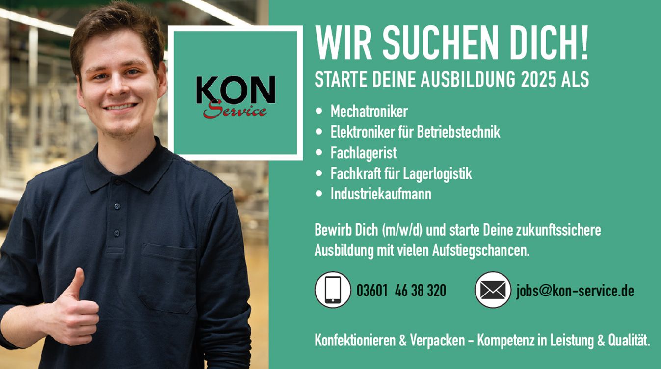 A man is giving a thumbs up in front of an advertisement for kon.