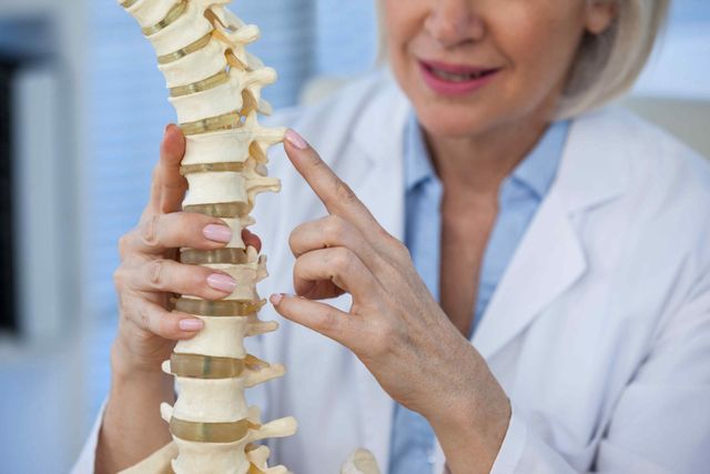 Doctor explaining how the spine works