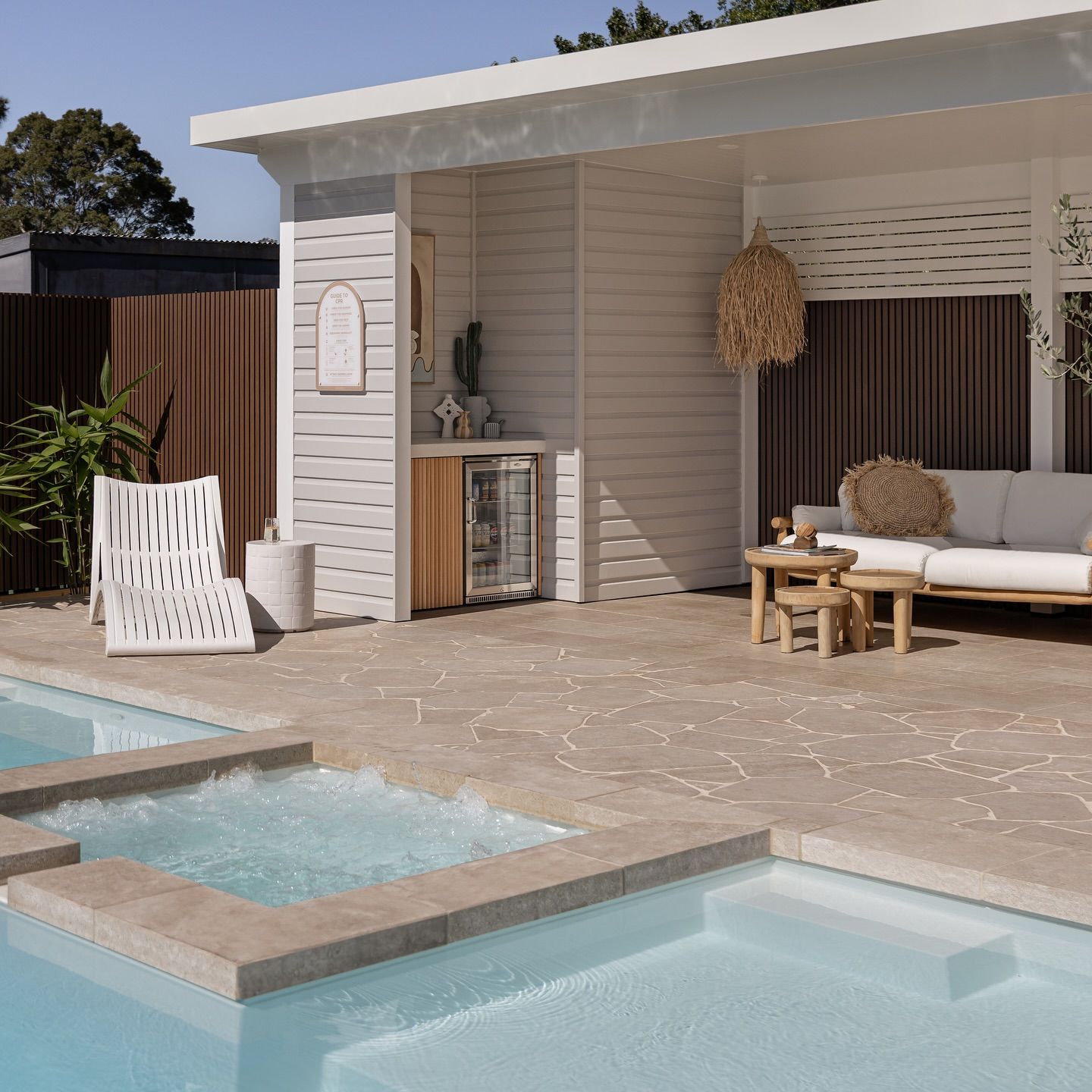 A Large Swimming Pool with a Cottage — Billabong Pool Co in Smeaton Grange, NSW