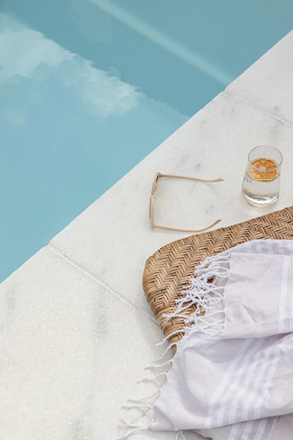 Poolside Scene With White Towel, Straw Hat — Billabong Pool Co in Smeaton Grange, NSW