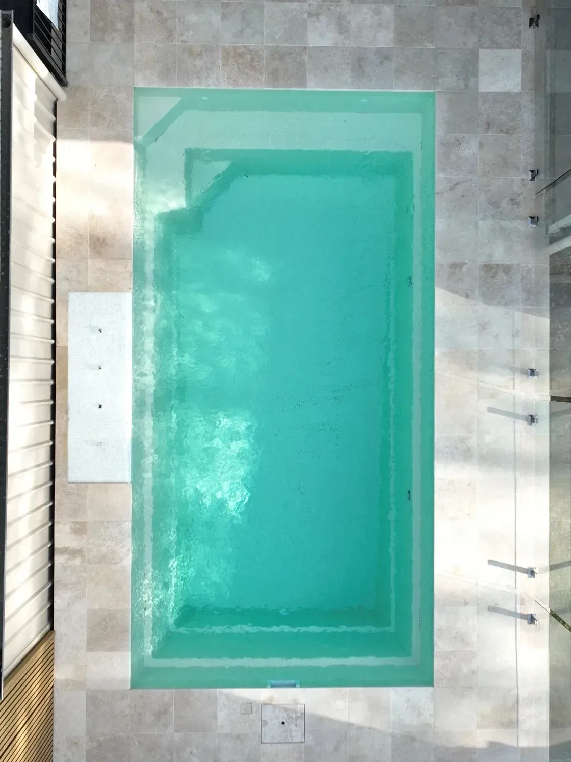A Turquoise Rectangular Swimming Pool Viewed From Above — Billabong Pool Co in Smeaton Grange, NSW