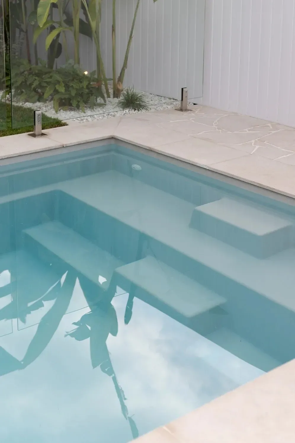 Modern Backyard Pool With Light Blue Water — Billabong Pool Co in Smeaton Grange, NSW