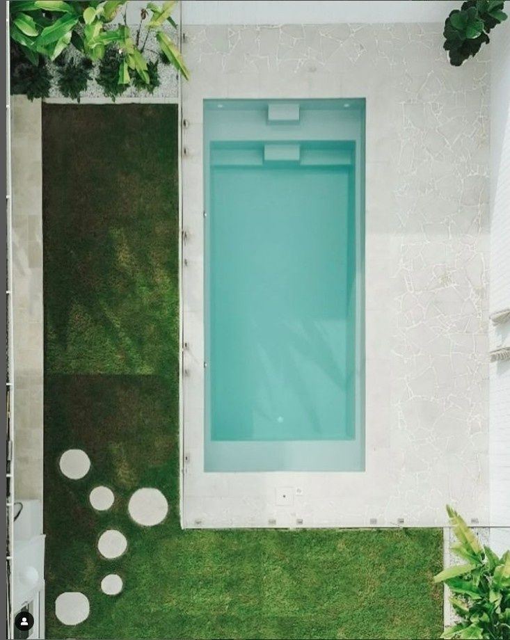 Top-down View of a Small Courtyard With a Turquoise Door — Billabong Pool Co in Smeaton Grange, NSW
