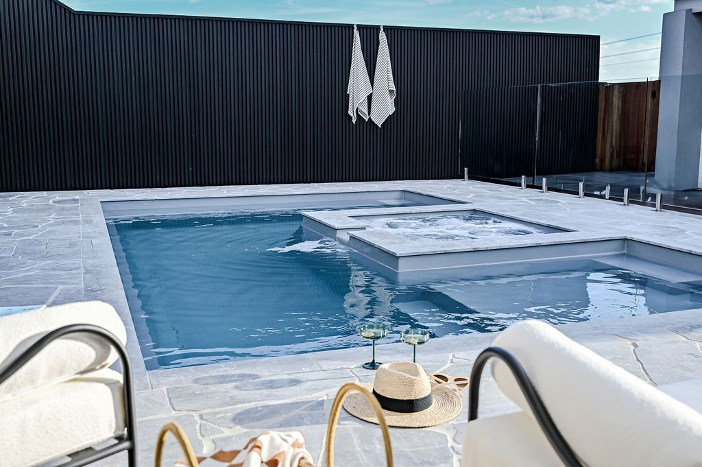 Outdoor Pool With Blue Water — Billabong Pool Co in Smeaton Grange, NSW
