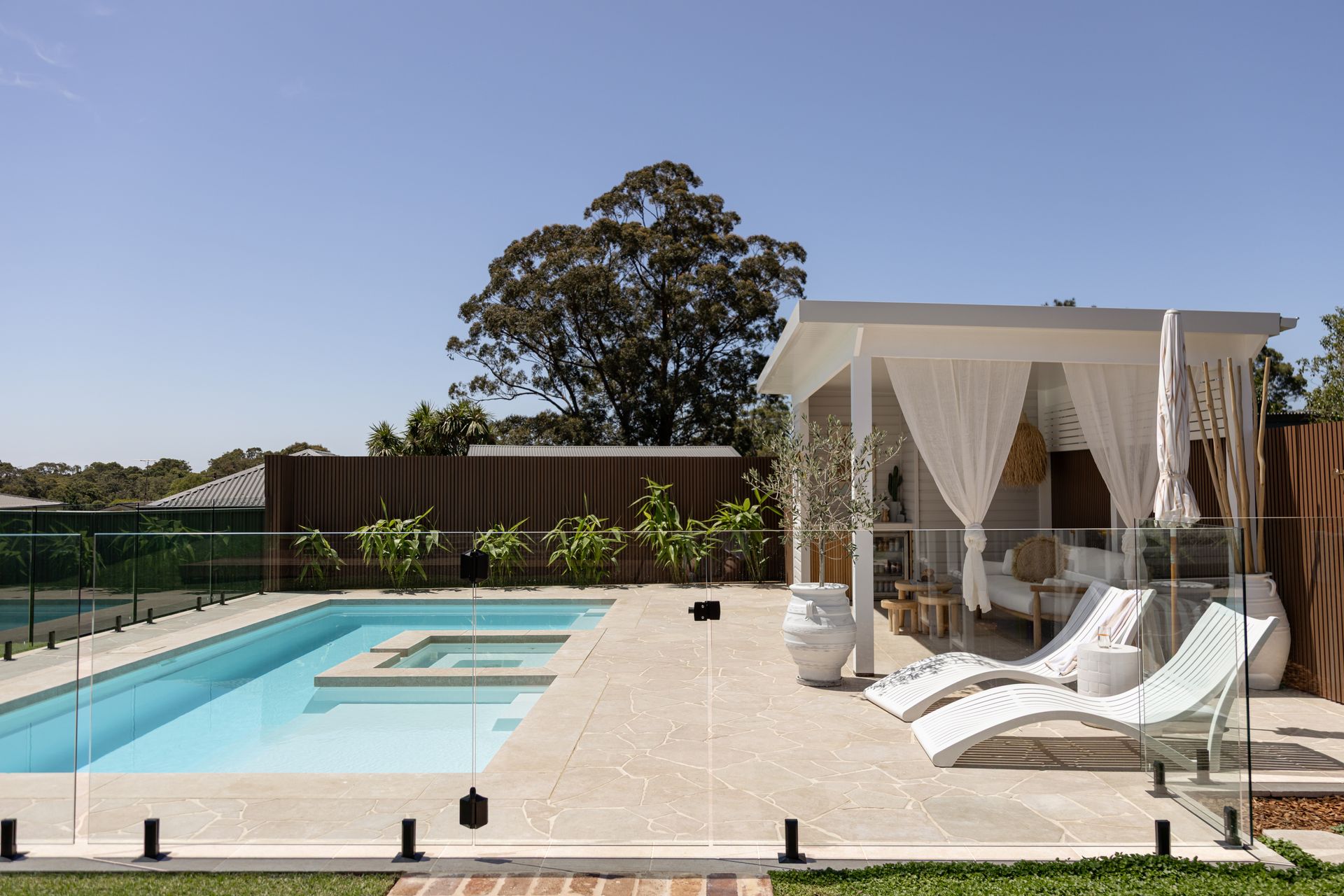 Modern Backyard With a Swimming Pool, Cabana — Billabong Pool Co in Smeaton Grange, NSW