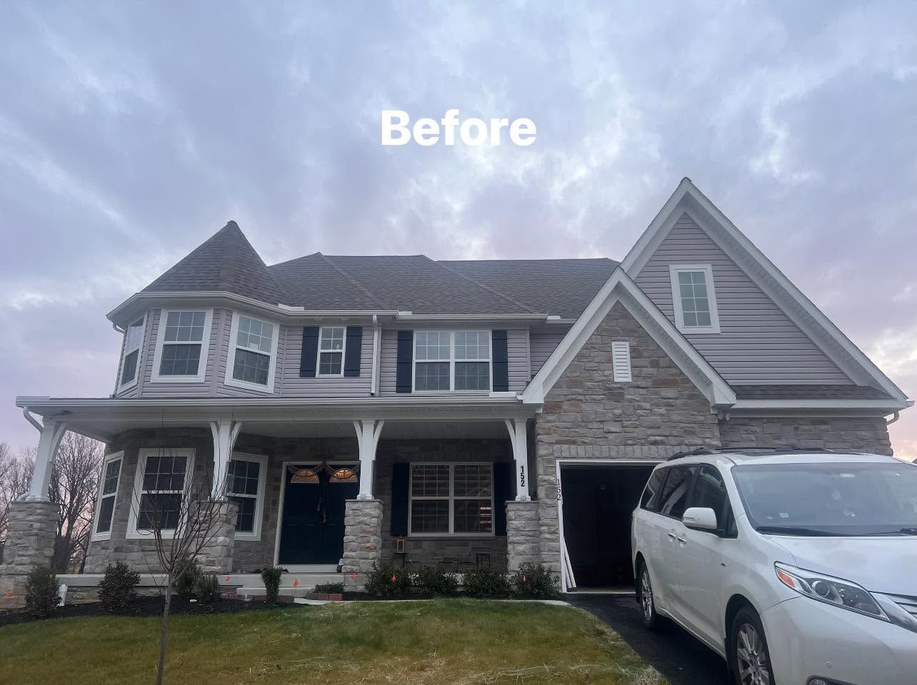 House exterior labeled “Before” with gray siding, front porch, and white SUV in the driveway
