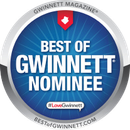 A blue circle with the words `` best of gwinnett nominee '' written on it.