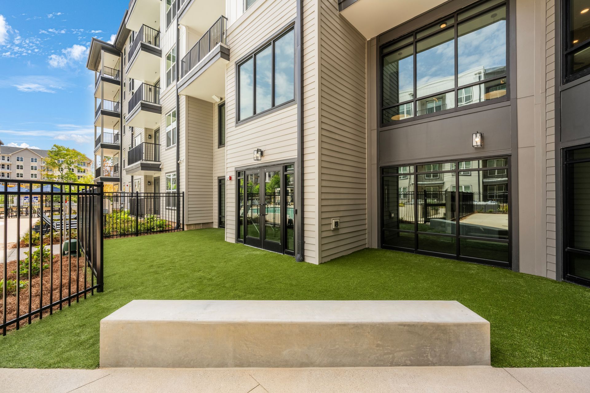 Outdoor green space at Conclave Sugar Hill. 