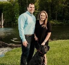 A Couple Smiling Together. Shop Wedding Registries at McAdams' Ltd., a Gift Store in Columbia, MO.